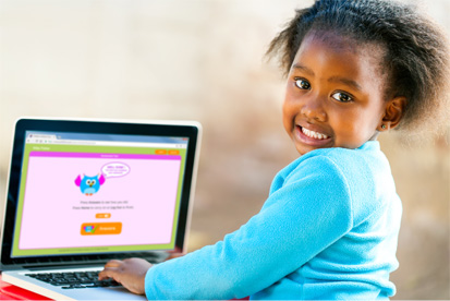 Happy girl doing maths homework on a laptop